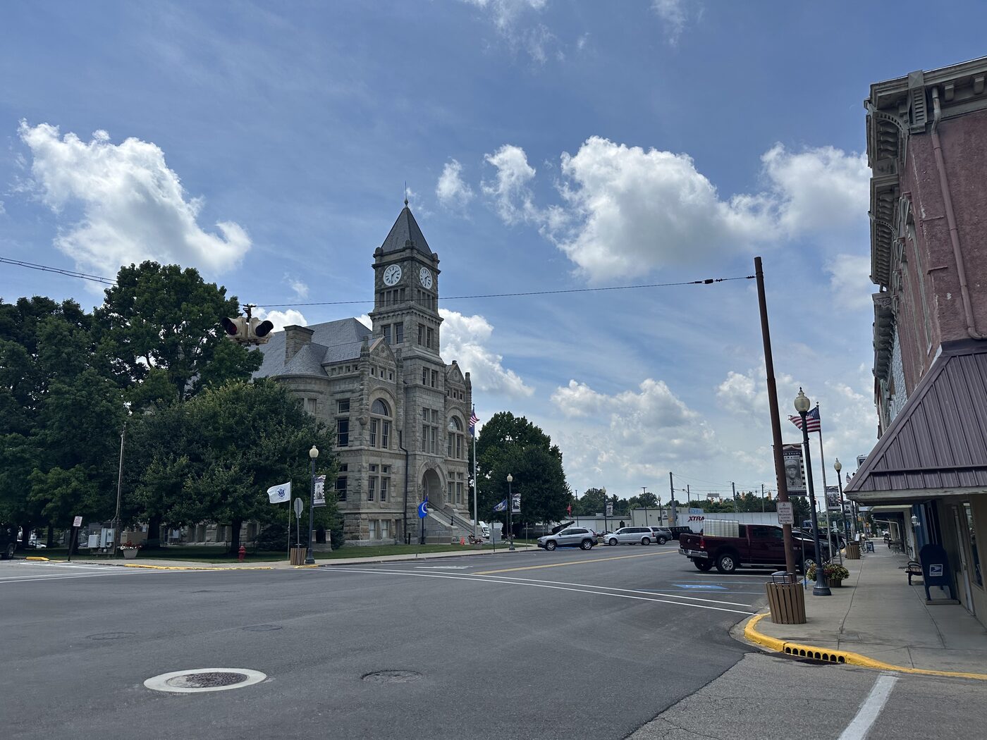 A historic clock-tower courthouse on a quiet small-town square in Liberty, Indiana.